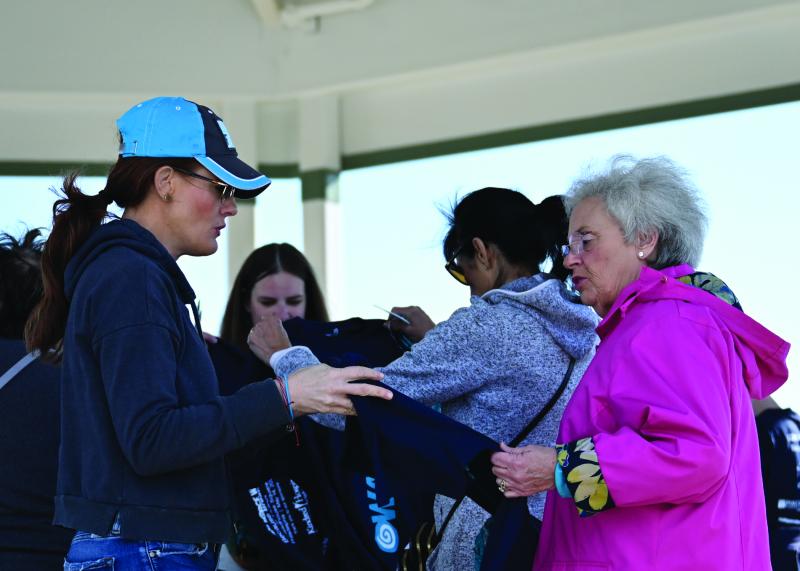 Shelley Perry and Jan Setman walk in honor of Doug Setman, who died of lung cancer.